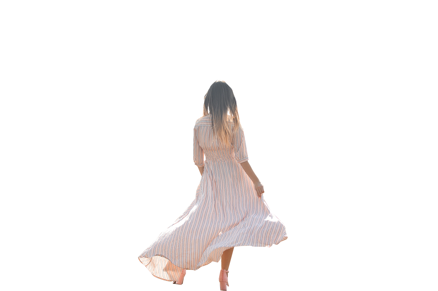 girl in striped flowy dress